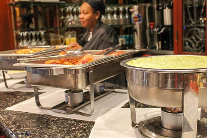 A person cooking food in a restaurant, with Beaufort Inn