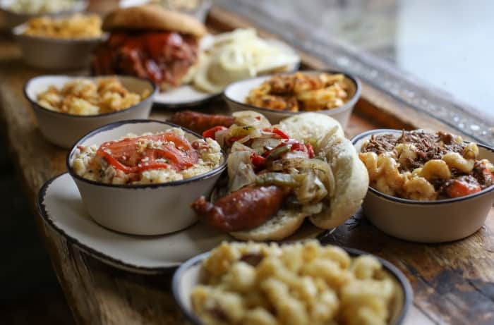 A plate of food on a table, with Autumnfest and Seven Springs