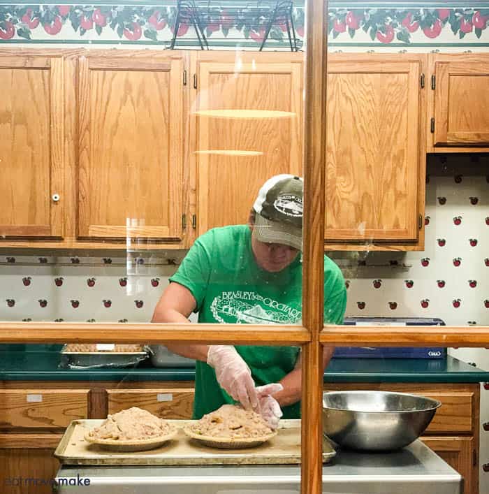 A man making apple pie