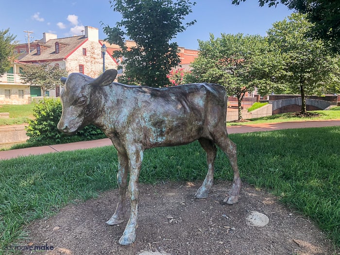 A cow statue in park