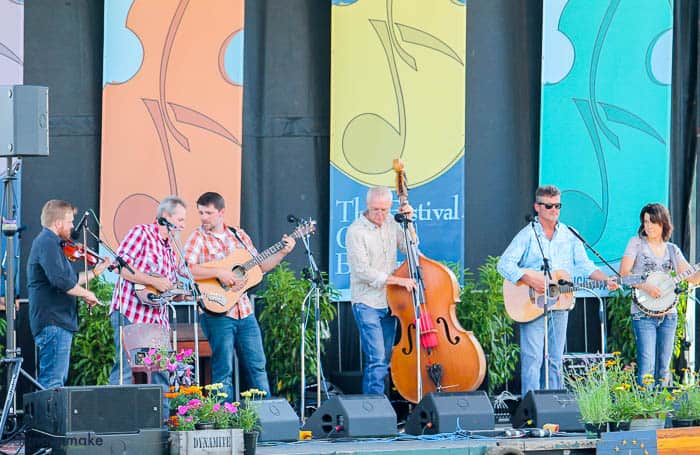 A group of people standing on a stage