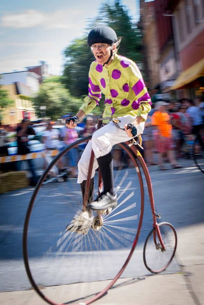 A person riding on the back of a bicycle