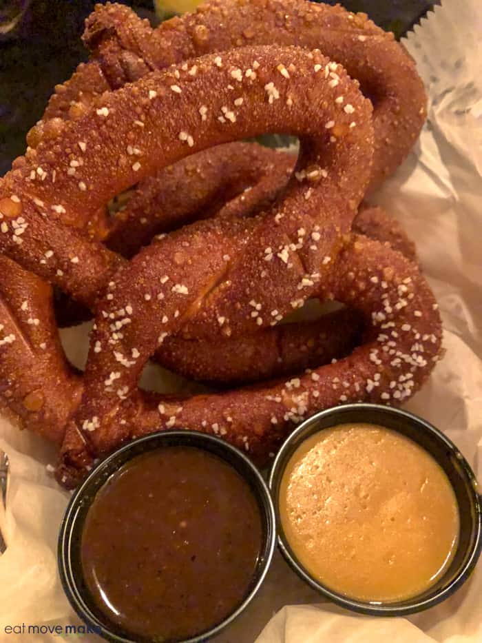 A close up of a beer pretzel on plate