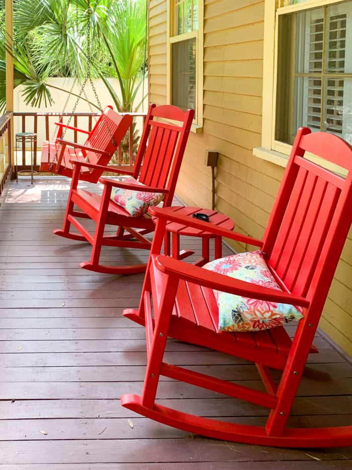 red rocking chairs on a porch