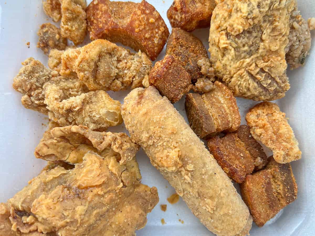 Quebedeaux's cracklins, boudin, meat pie