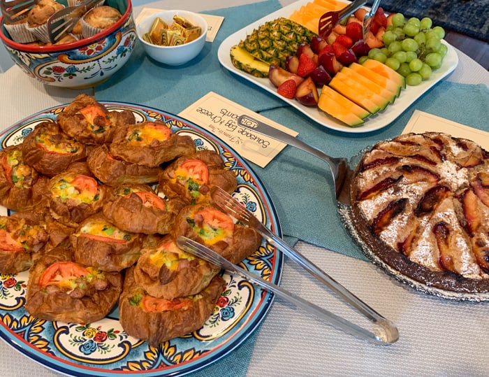 A table topped with different types of food on a plate 