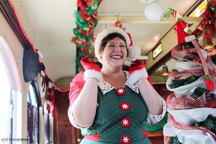 A woman wearing a costume, with North Pole Express