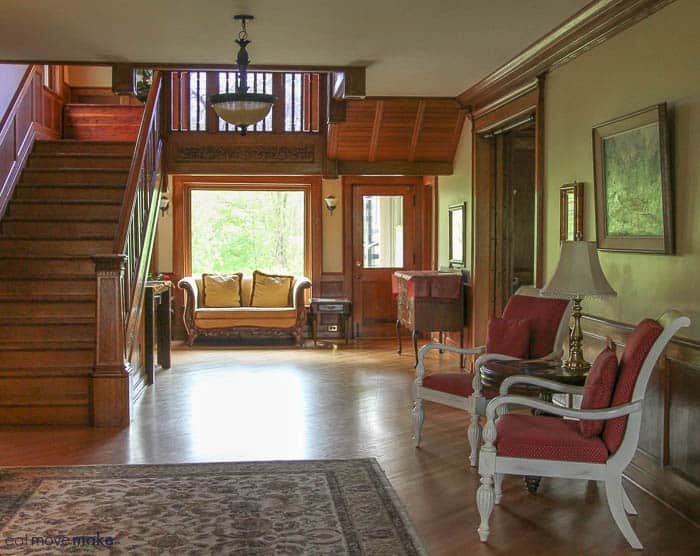 A living room filled with furniture and a large window