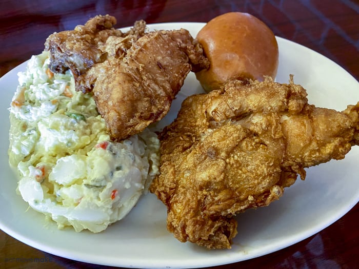 fried chicken, coleslaw and potato salad on plate