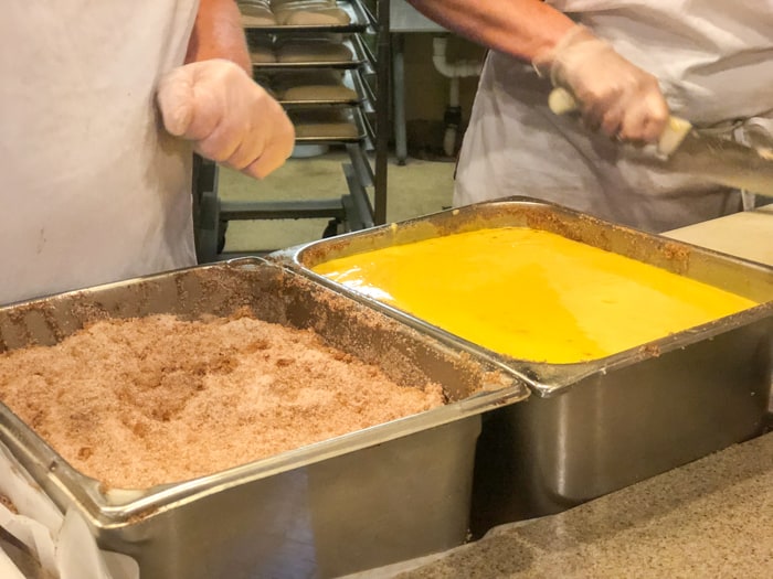 cooks preparing cinnamon bread