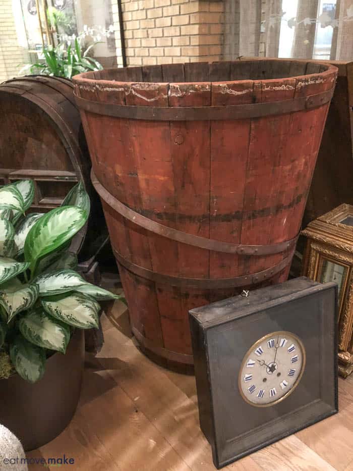 A clock sitting on top of a wooden table