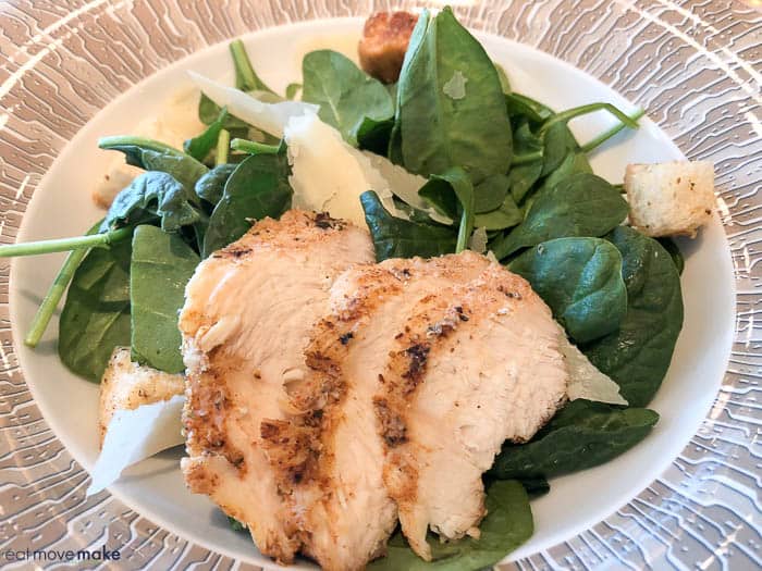 chicken caesar salad on plate