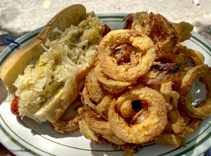 sauer kraut hot dog and onion rings