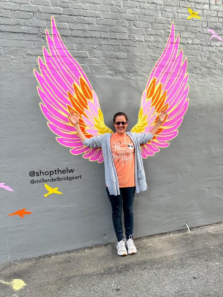 lady with wings mural in Goldsboro