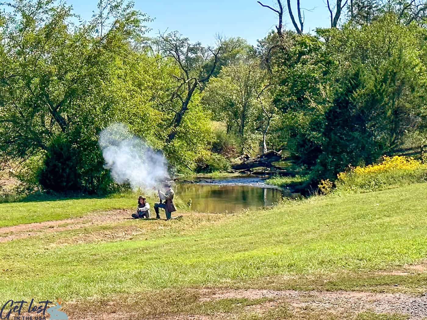 guns firing during civil war reenactment.