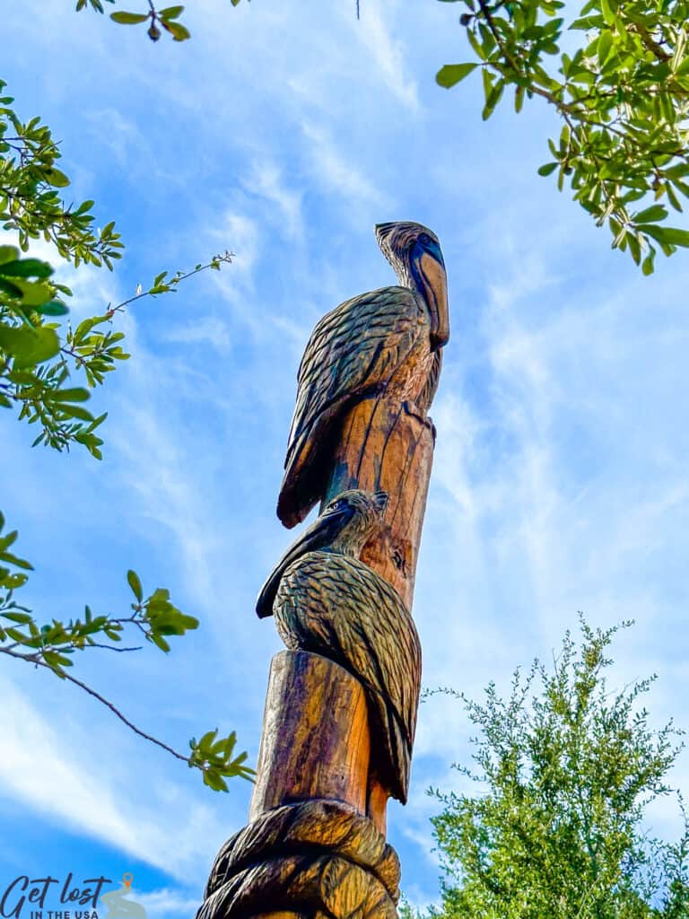 pelican carving in park.