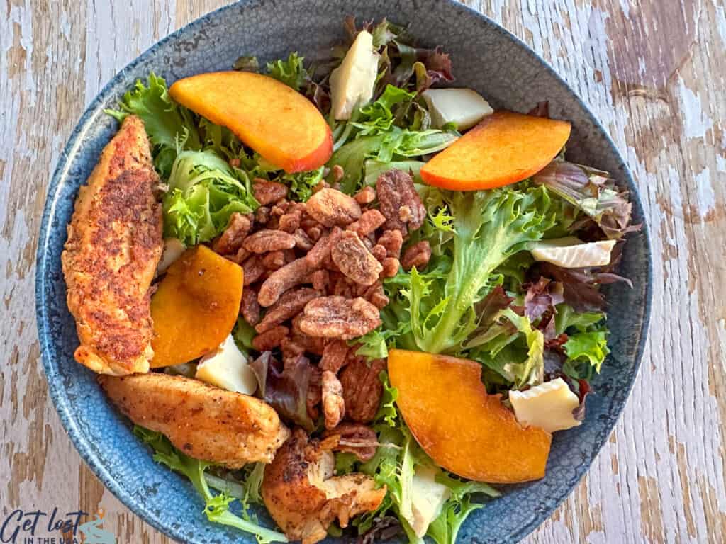 salad with peaches, pecans and chicken.