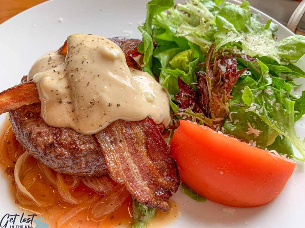 Chop Steak Grilled with Bleu Cheese, Onion Gravy, Side Salad.