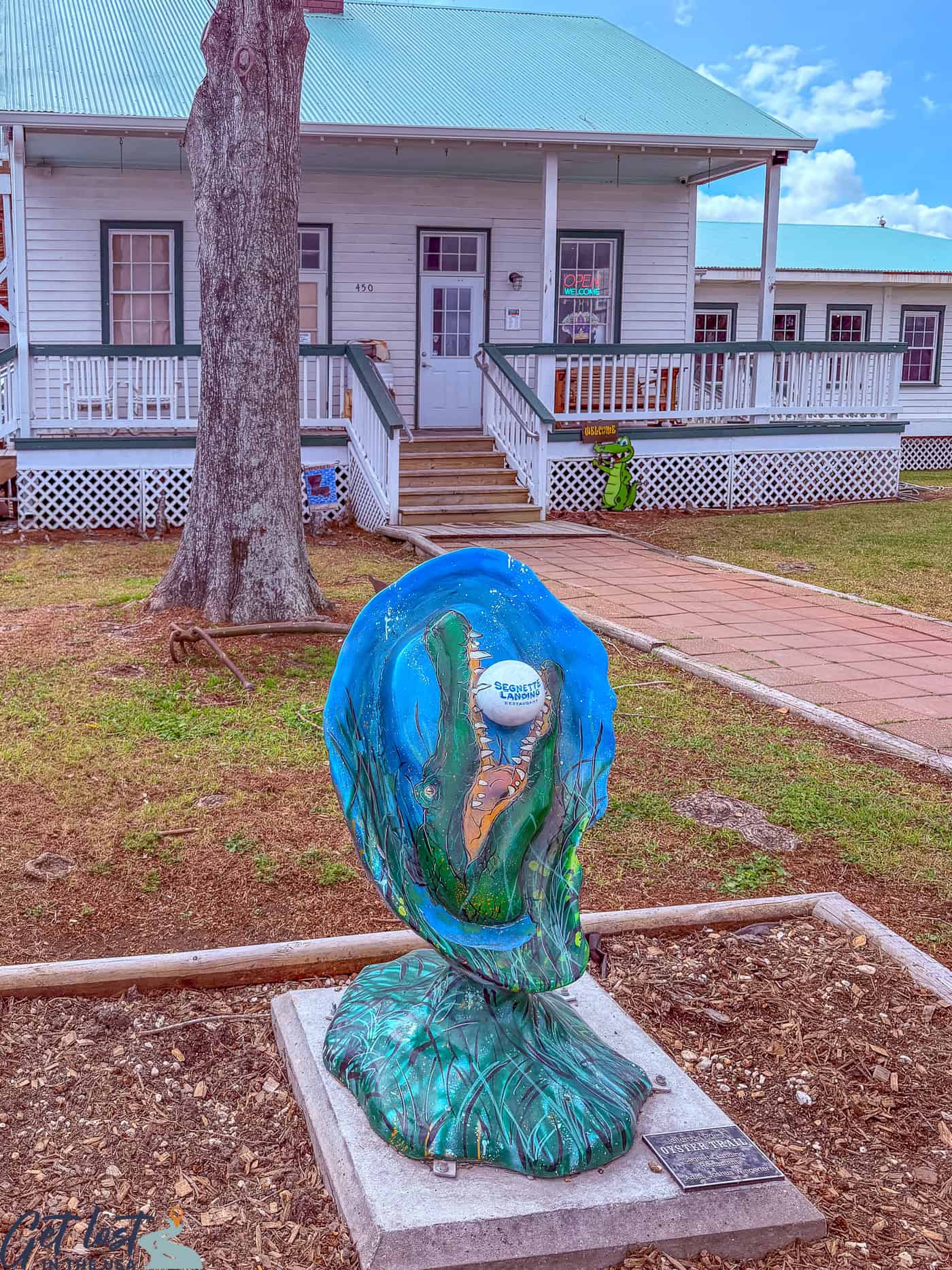 Oyster Trail artwork in front of Segnette Landing restaurant.