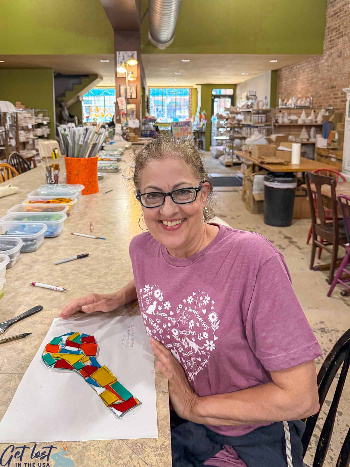 lady with glass mosaic designed spoon rest.