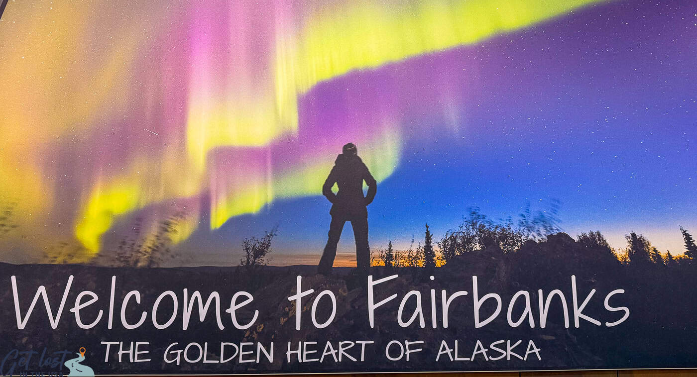 Welcome to Fairbanks poster in airport.
