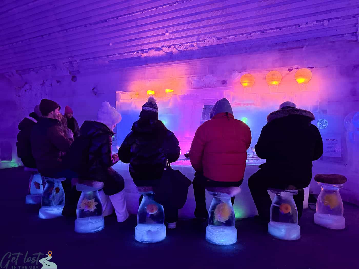 people at ice bar in Chena Hot Springs Resort Ice Museum.