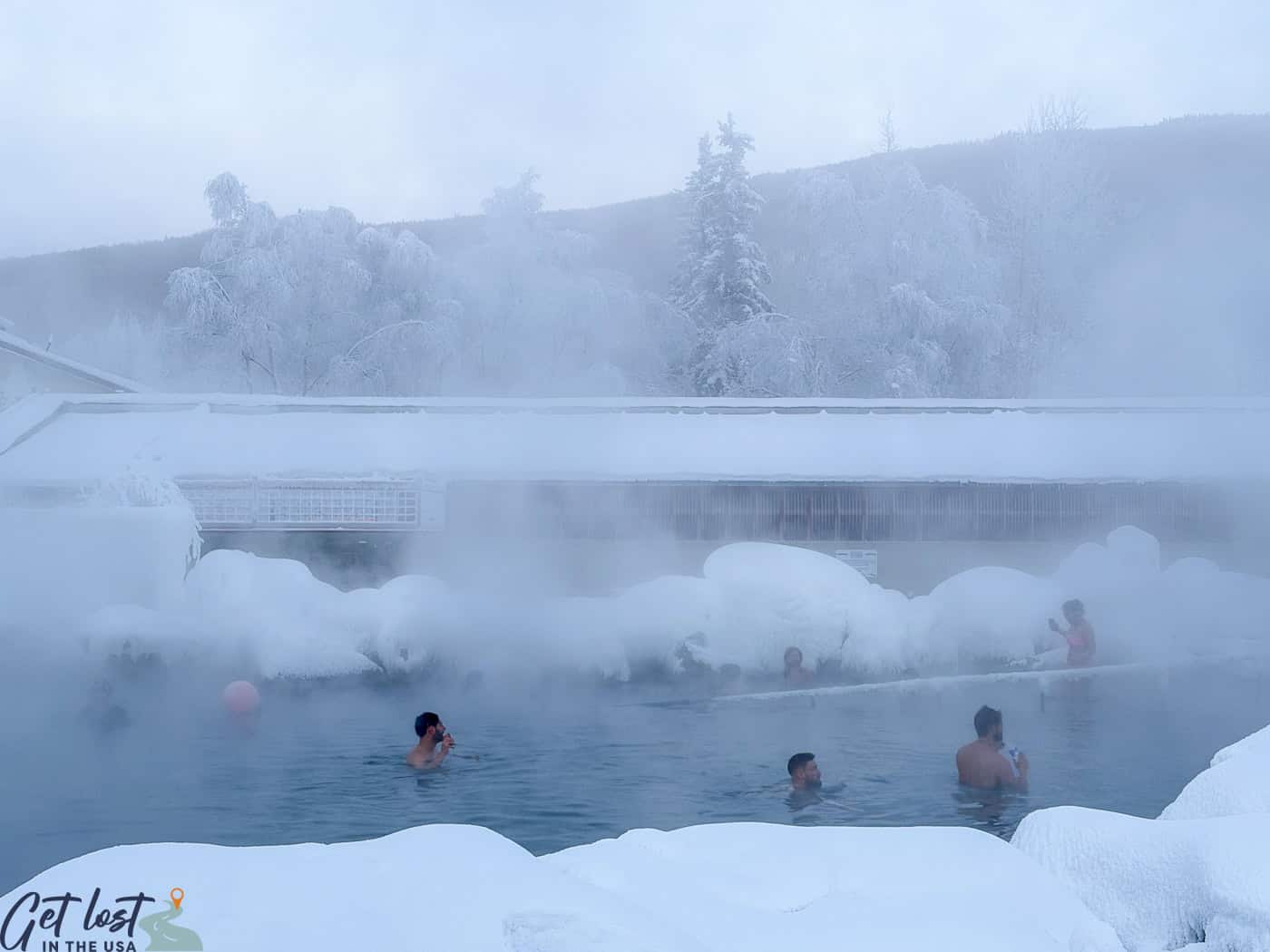 people in hot springs at Chena Hot Springs Resort.