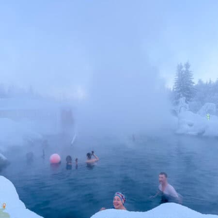 people in the hot springs at Chena Hot Springs Resort.