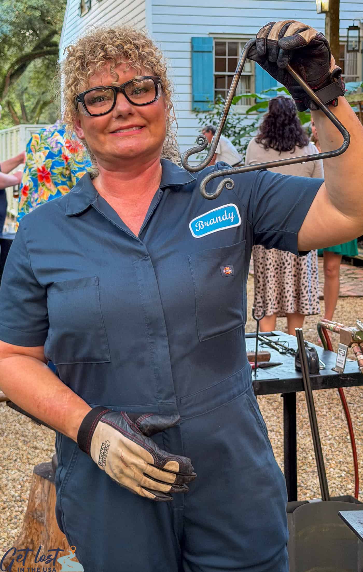 Brandy Aube holding one of her Cajun triangles.