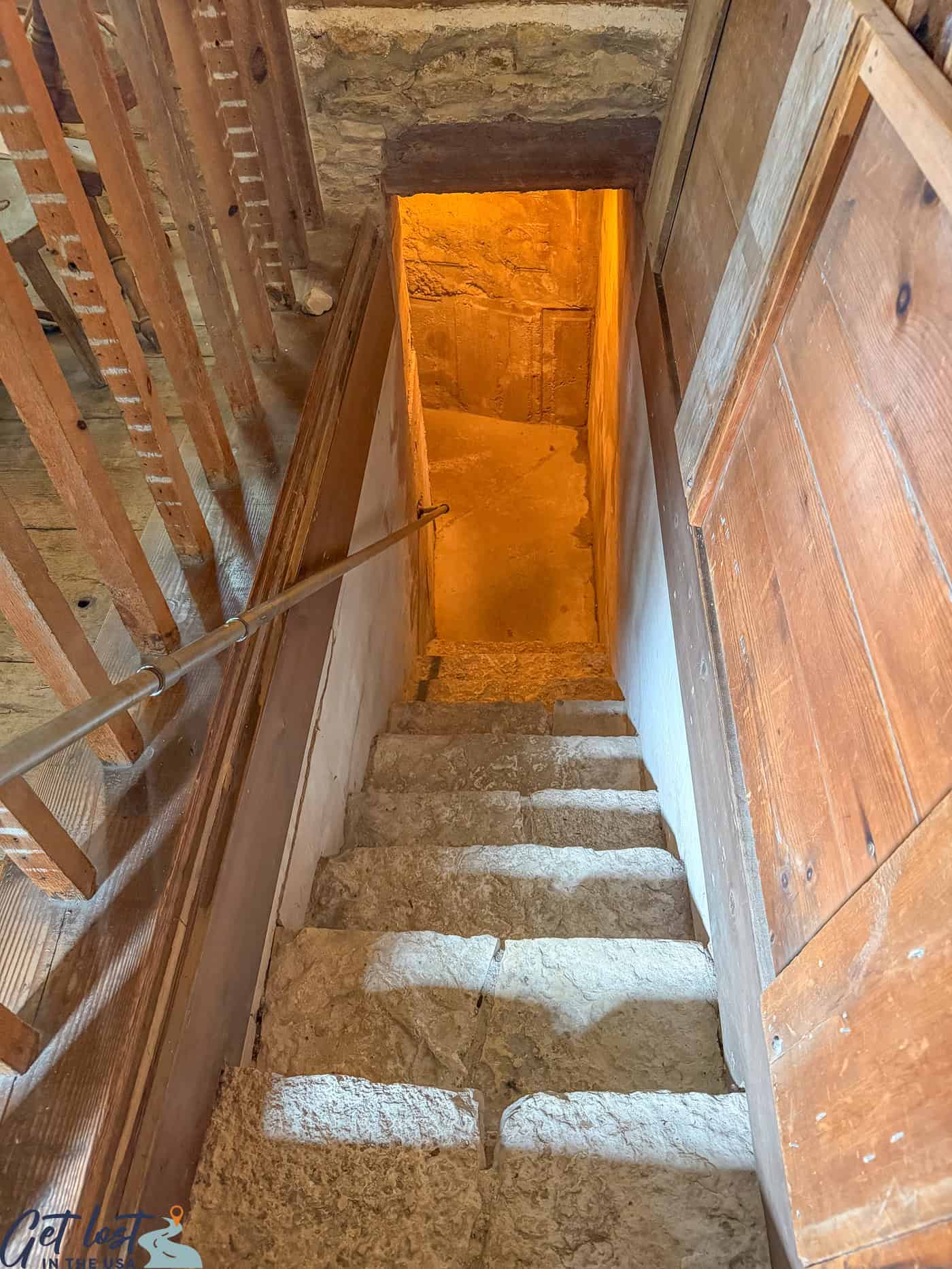 staircase from tunnel into cabin at Milton House Museum.