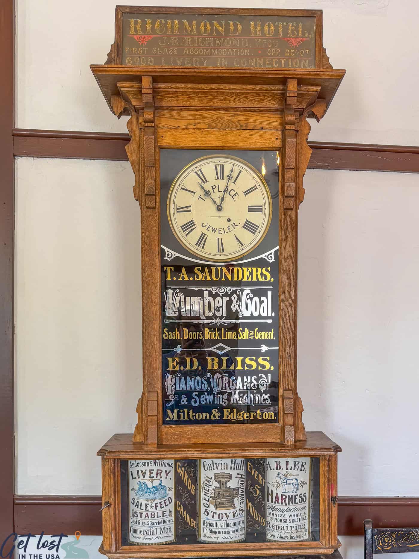 vintage clock with advertising rolls.